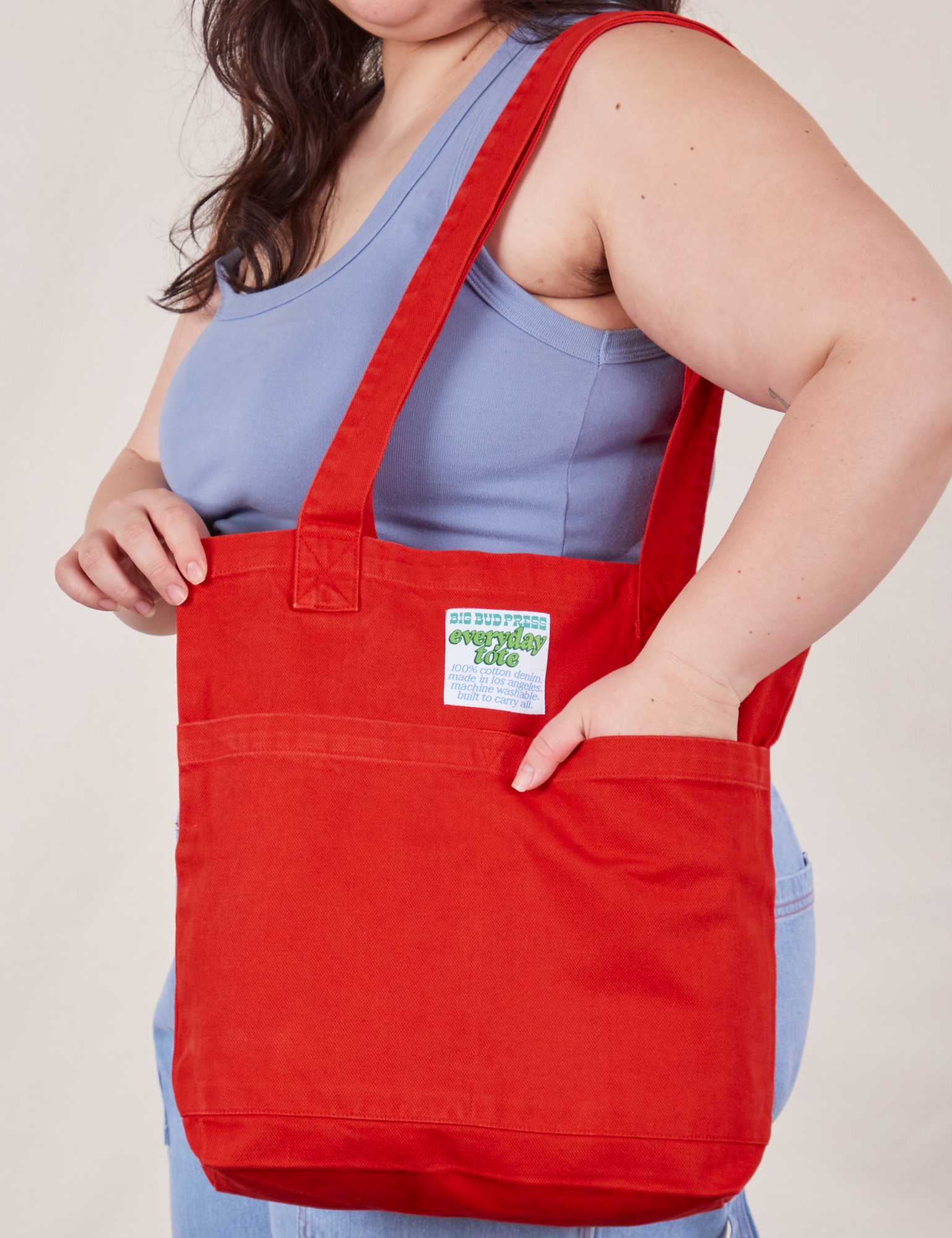 Everyday Tote Bag in Mustang Red worn by model