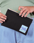 Pencil Pouch in Basic Black held by model