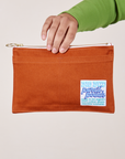 Pencil Pouch in Burnt Terracotta held by model