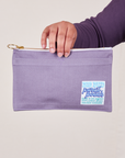 Pencil Pouch in Faded Grape held by model