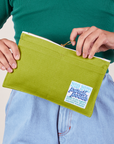 Pencil Pouch in Gross Green held by model