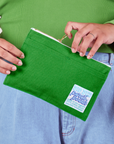Pencil Pouch in Kelly Green held by model