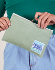 Pencil Pouch in Sage Green held by model