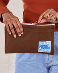 Pencil Pouch in Fudgesicle Brown held by model