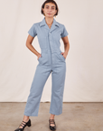 Soraya is 5’2” and wearing XXS Petite Short Sleeve Jumpsuit in Periwinkle