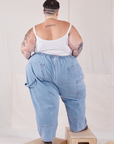 Back view of Petite Carpenter Jeans in Light Wash and vintage off-white Cami on Jordan