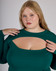 Close up of Juliet wearing the Hunter Green Long Sleeve Porthole Tee