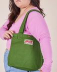 Lawn Green Shopper Tote on model's shoulder