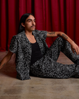 Anthony is wearing Spider Webs Pantry Button-Up and matching Drop Pocket Cargo Pants
