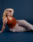 Work Pants in Rainbow Stripe and burnt terracotta Cropped Tank on Juliet
