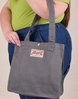 Shopper Tote Bag in Washed Grey hanging off Marielena's arm
