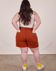Back view of Classic Work Shorts in Paprika. Ashley has both hands in the back pockets.