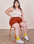 Ashley is 5’7” and wearing 1XL Classic Work Shorts in Paprika paired with Tank Top in vintage tee off-white