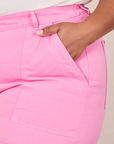 Classic Work Shorts in Bubblegum Pink pocket close up. Morgan has her hand in the pocket.