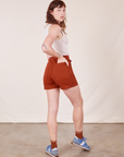 Angled back view of Classic Work Shorts in Paprika and Tank Top in  vintage tee off-white
