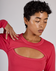 Close up of Mika wearing the Hot Pink Long Sleeve Porthole Tee