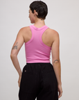 Back view of Alex wearing the P Bubblegum Pink Deep Cut Racerback