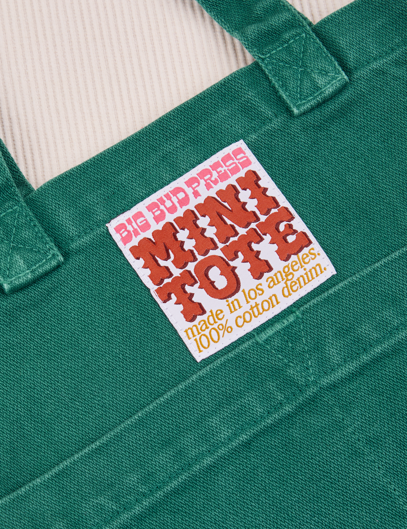 Mini Tote Bag in Hunter Green label close up