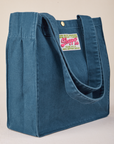 Angled view of Shopper Tote Bag in Lagoon