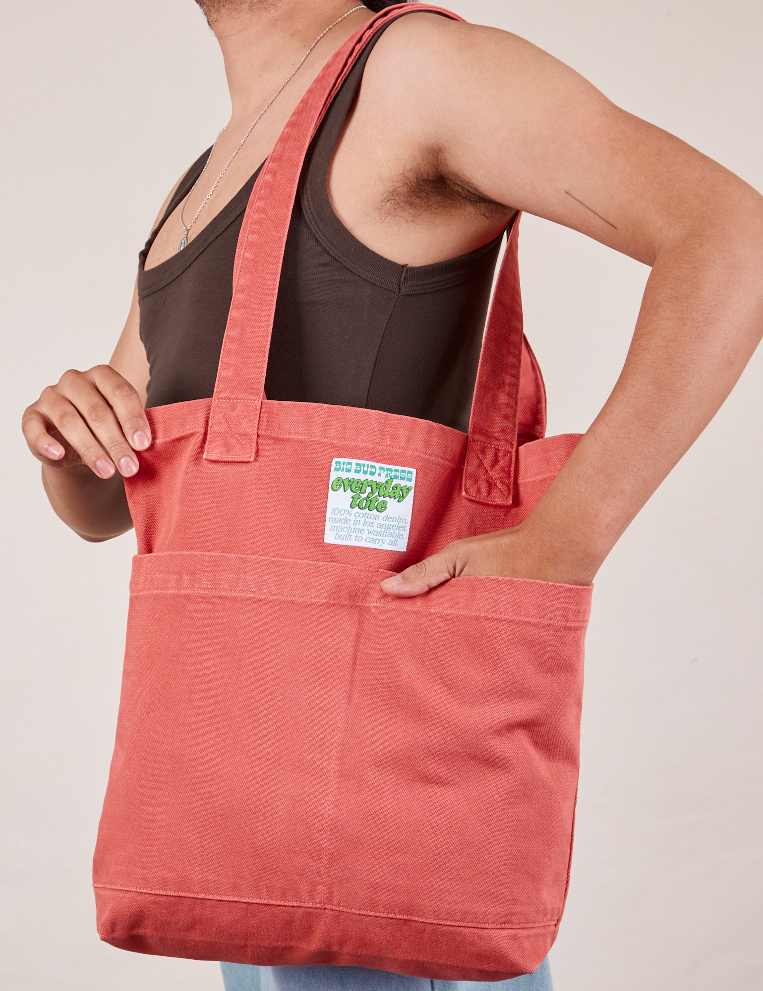 Everyday Tote Bag in Raspberry worn by model