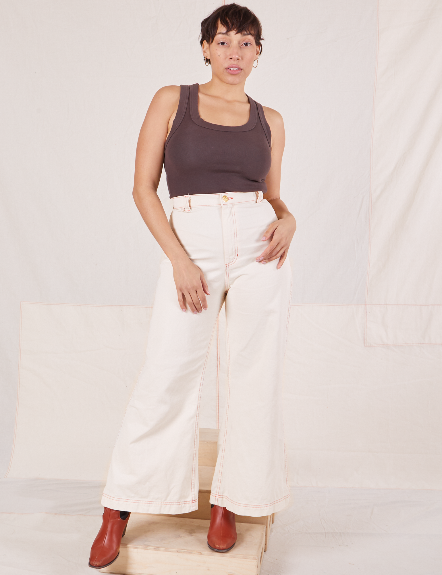 Tiara is 5'4" and wearing XS Bell Bottoms in Vintage Tee Off-White paired with espresso brown Tank Top