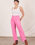 Tiara is 5'4" and wearing S Western Pants in Bubblegum Pink paired with Tank Top in vintage tee off-white