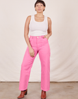 Tiara is 5'4" and wearing size S Work Pants in Bubblegum Pink paired with vintage off-white Tank Top