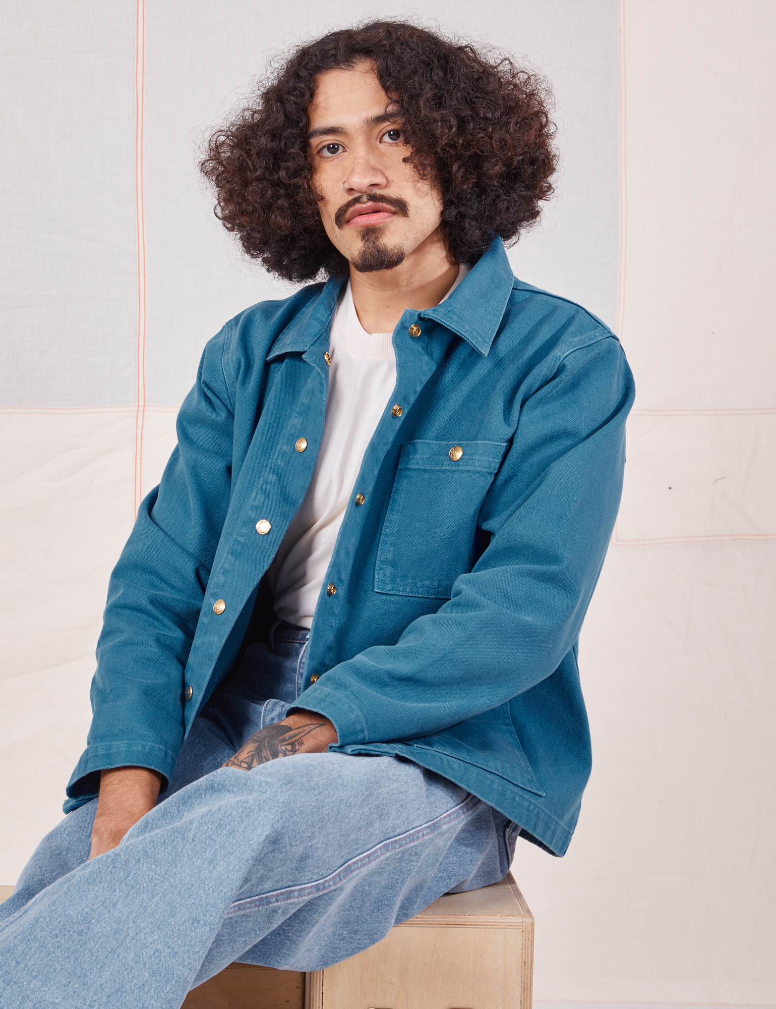 Jesse is 5&#39;8&quot; and wearing S Denim Work Jacket in Marine Blue