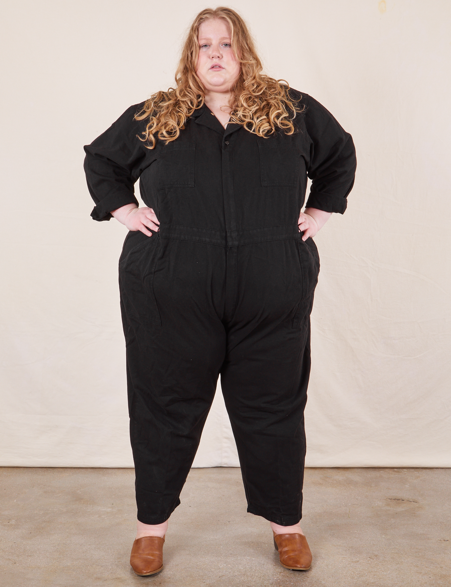 Catie is 5&#39;11&quot; and wearing 5XL Everyday Jumpsuit in Basic Black
