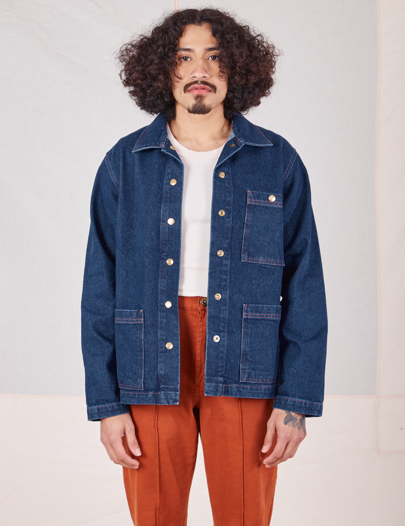 Jesse is 5'8" and wearing S Indigo Denim Work Jacket in Dark Wash