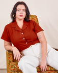 Faye is wearing M Pantry Button-Up in Paprika paired with vintage tee off-white Western Pants