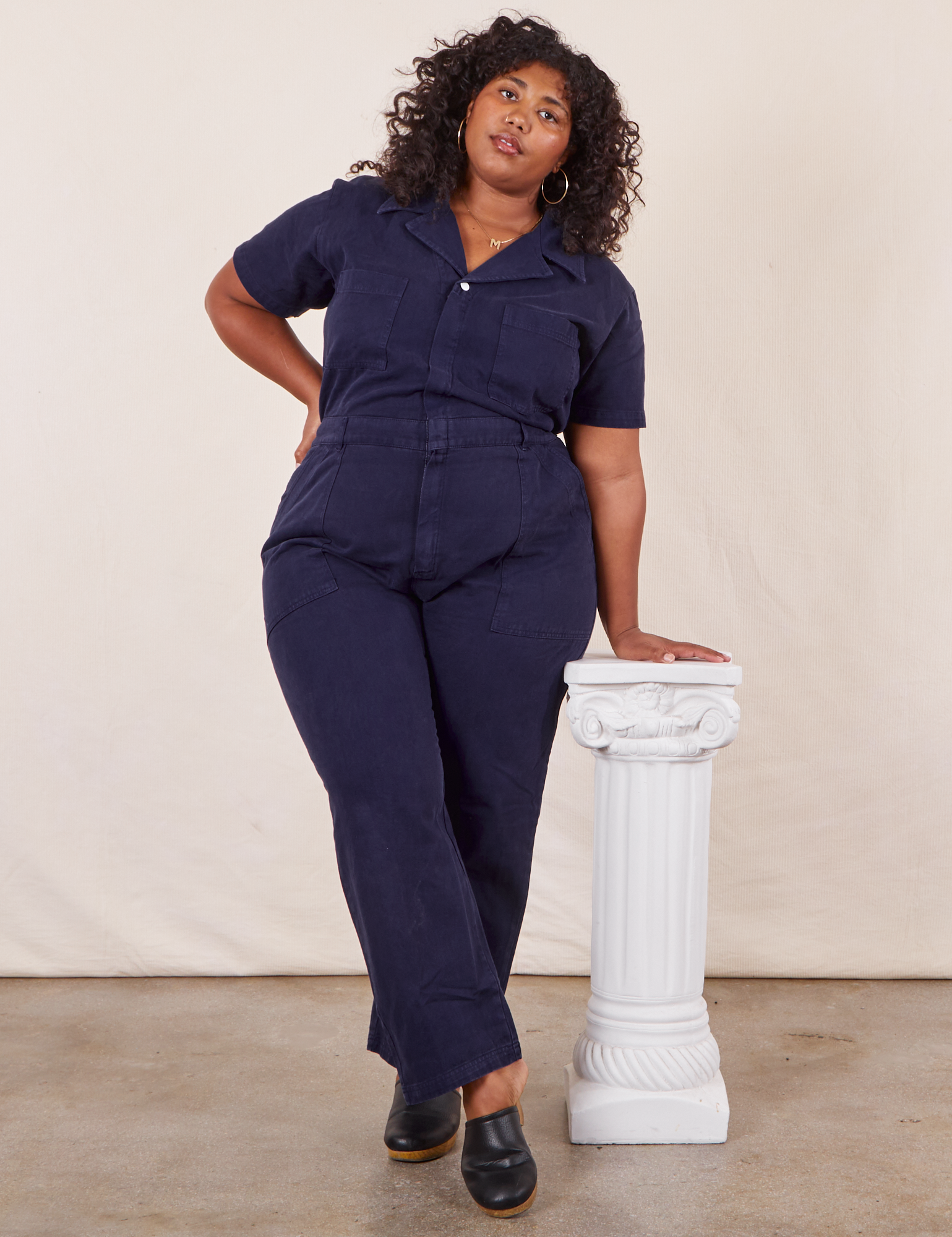 Morgan is 5&#39;5&quot; and wearing 2XL Short Sleeve Jumpsuit in Navy Blue