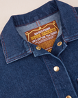 Indigo Denim Work Jacket in Dark Wash collar and brass button close up