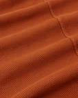 Long Sleeve Fisherman Polo in Burnt Terracotta fabric detail