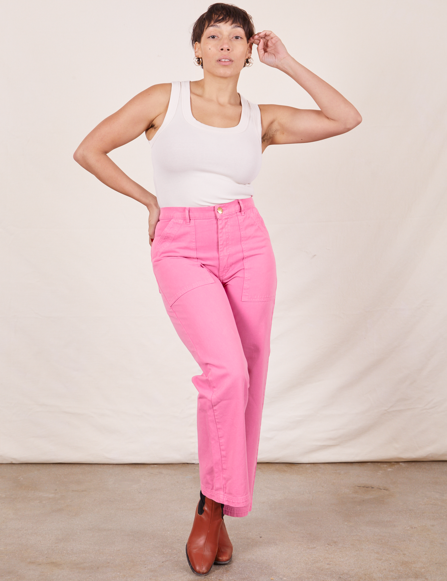 Work Pants in Bubblegum Pink on Tiara wearing Tank Top in vintage tee off-white