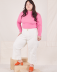 Ashley is wearing Essential Turtleneck in Bubblegum Pink and vintage tee off-white Western Pants
