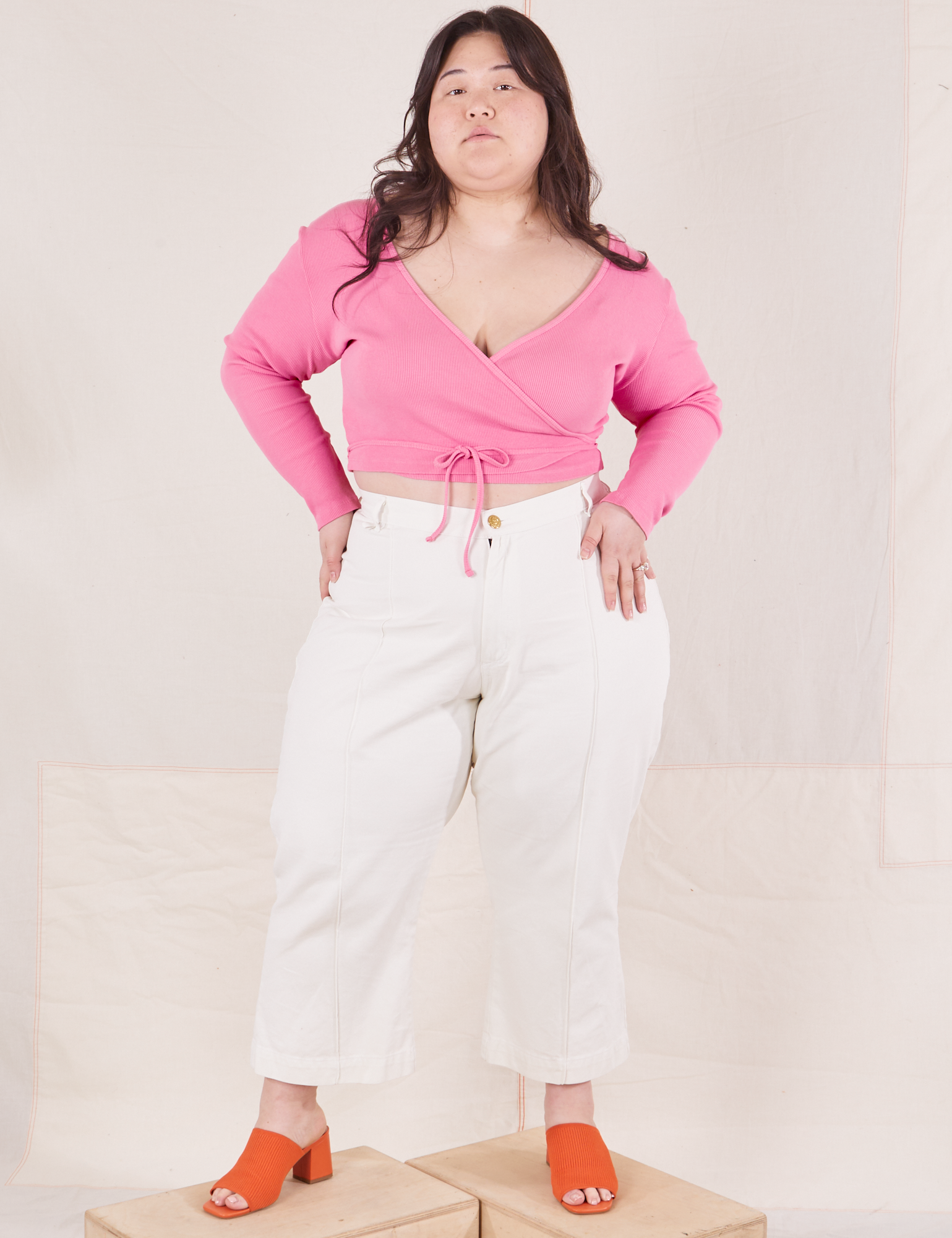Wrap Top in Bubblegum Pink on Ashley wearing vintage tee off-white Western Pants