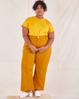 Morgan is wearing Organic Vintage Tee in Sunshine Yellow and spicy mustard Western Pants