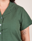Pantry Button-Up in Dark Emerald Green front close up on Faye