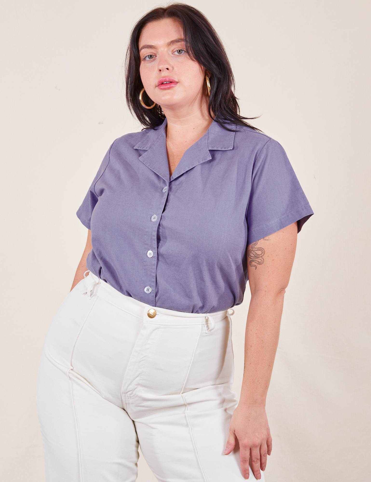 Faye is wearing Pantry Button-Up in Faded Grape tucked into vintage tee off-white Western Pants