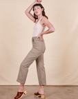 Side view of Work Pants in Khaki Grey and vintage off-white Tank Top on Alex