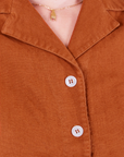 Front close up of Pantry Button-Up in Burnt Terracotta worn by Alex