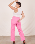 Work Pants in Bubblegum Pink back view on Tiara wearing Tank Top in vintage tee off-white