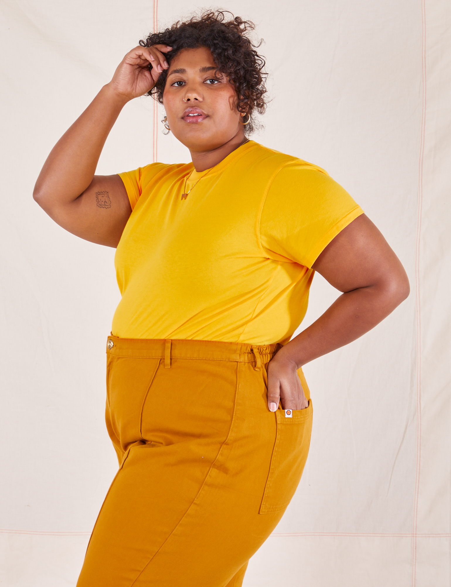 Side view of Organic Vintage Tee in Sunshine Yellow worn by Morgan