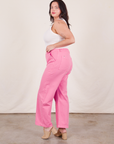 Side view of Work Pants in Bubblegum Pink on Faye
