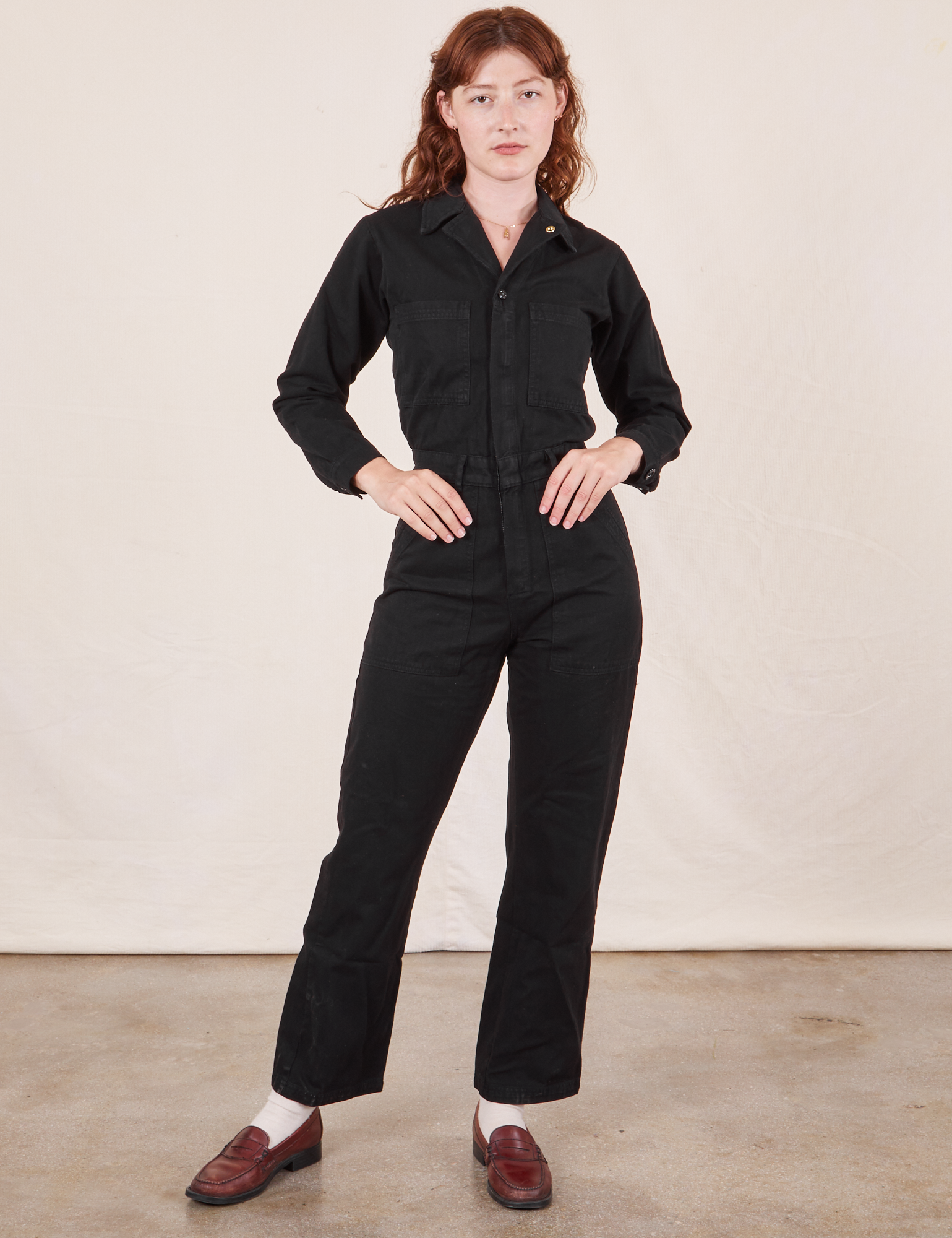 Alex is 5&#39;8&quot; and wearing XS Everyday Jumpsuit in Basic Black