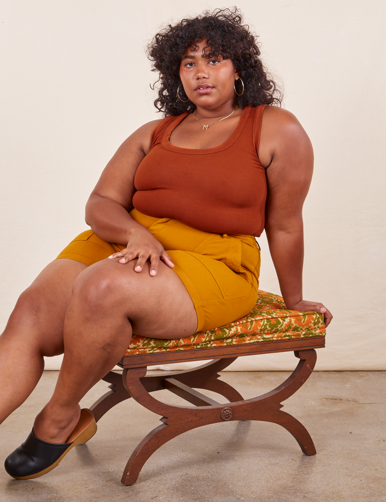 Morgan is wearing Tank Top in Burnt Terracotta