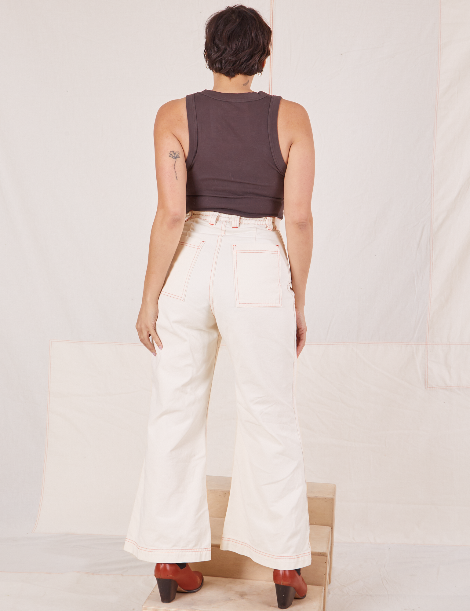 Back view of Bell Bottoms in Vintage Tee Off-White and espresso brown Tank Top worn by Tiara