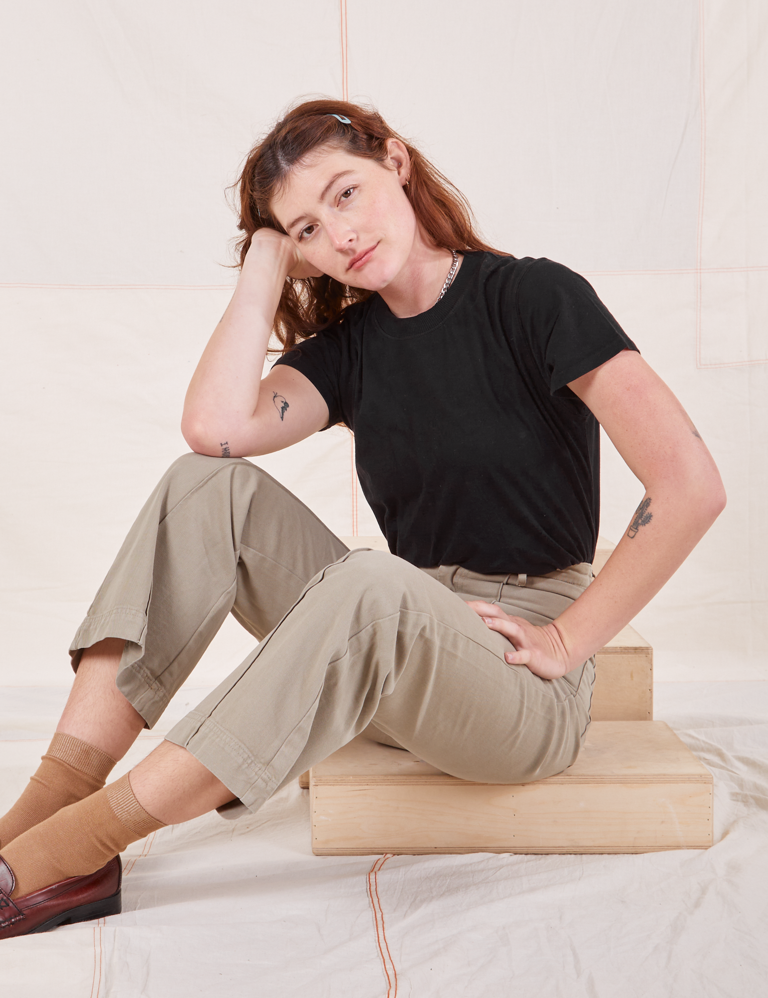 Alex is wearing Organic Vintage Tee in Basic Black and khaki grey Western Pants