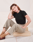 Alex is wearing Organic Vintage Tee in Basic Black and khaki grey Western Pants